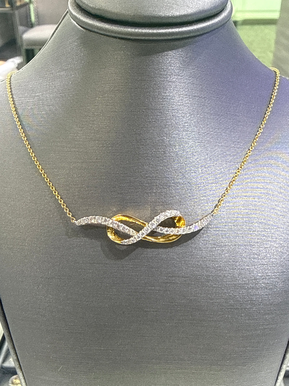 14K Yellow Gold Infinity Diamond Necklace. N1453Y. LA2600. 33RD=0.45CT. G-H Color VS2/SI Clarity