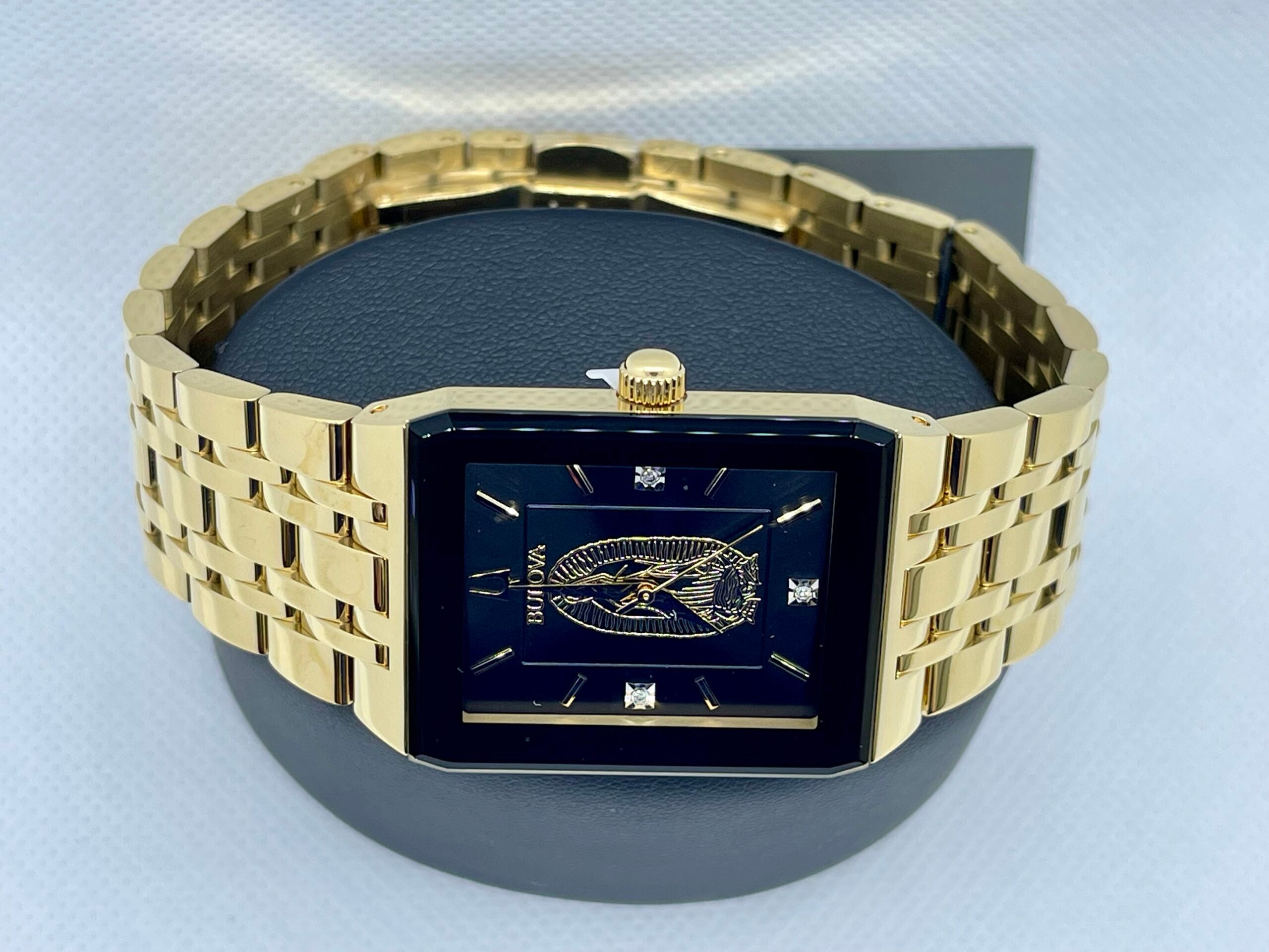 Bulova Our Lady of Guadalupe Gold Stainless Steel Band 3-Hand Black Dial Quartz Watch (Model:97D130)